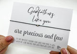 a person holding a card with a message on it