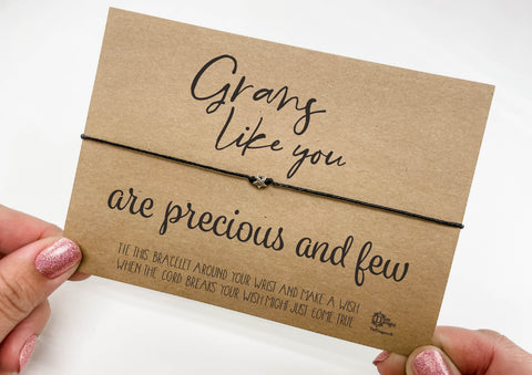 a person holding a card with a message on it